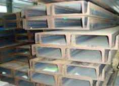 Structural steel channels stacked in the yard